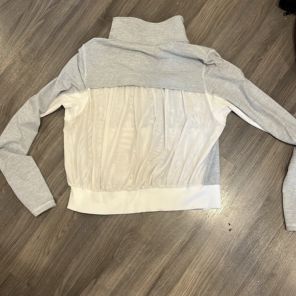 Lululemon jacket, size 12, mesh back, thumb holes, and zipper pockets - Picture 2 of 4